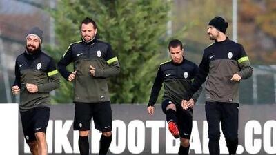 From left, Juventus' Andrea Pirlo, Simone Pepe, Sebastian Giovinco and Mirko Vucinic warm up ahead of Tuesday's Champions League match with Chelsea.
