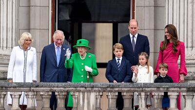 Charles and Camilla with Queen Elizabeth, Prince William, his wife Kate and their children George, Charlotte and Louis at the end of the Platinum Pageant in London as part of the queen's platinum jubilee celebrations. AFP