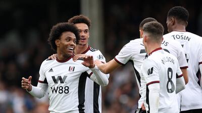 Willian celebrates scoring Fulham's first goal. Reuters