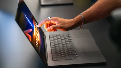 Apple says the touchscreen MacBook Pro with PROLED XDR offers 'the world’s best laptop display'. Photo: Bloomberg