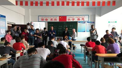 Reporters in a Mandarin class in a vocational centre.