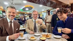From left: Matt Damon, Christopher Nolan and Tom Holland at Olympia Coffee House in Mumbai. Universal Pictures India / Instagram