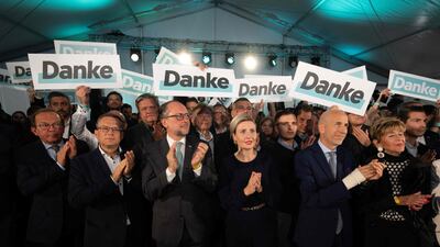 Austrian People's Party (OeVP) members, Austrian Minister for European and International Affairs Alexander Schallenberg, centre, Austrian Minister for Women, Family, Integration and Media, Susanne Raab, right, and Austrian Labor Minister Martin Kocher, second right. AFP