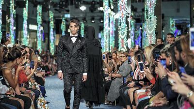 Models walk up and down the catwalk during the Dolce & Gabbana Fashion Show at Dubai Mall.