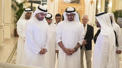 Sheikh Mohammed bin Zayed, Crown Prince of Abu Dhabi Deputy Supreme Commander of the Armed Forces, inspects a Dh 12 billion worth plan to develop the southern part of Yas Island, from Miral Asset Management Organisation, during a Sea Palace barza. Seen with Mohammed Al Mubarak, Chairman of Abu Dhabi Tourism and Culture Authority (L). Hamad Al Kaabi / Crown Prince Court - Abu Dhabi