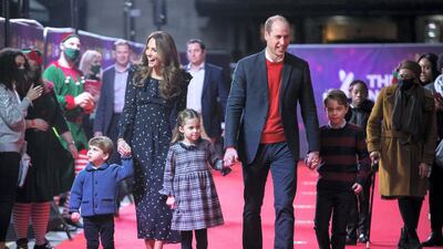 Prince William and Catherine, Duchess of Cambridge with their children, Prince Louis, Princess Charlotte and Prince George, attend a special pantomime performance at London's Palladium Theatre in December 2020. Getty Images