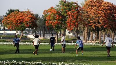 People wearing protective face mask as a preventive measure against the spread of coronavirus in Dubai. (Pawan Singh / The National)