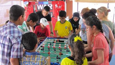 Rym’s Fifa Foosball Championship, with prizes for all the refugee children, was a huge hit, with the initially shy girls turning out to be as adept as their male rivals. Rym Ghazal / The National