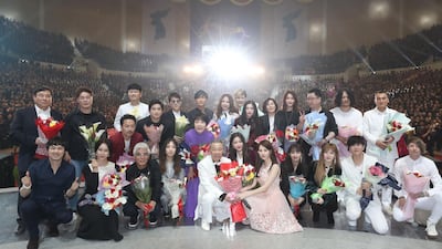 South and North Korean musicians pose for a group photo after a joint show. AFP / Korea Pool