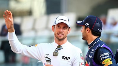 Ricciardo and Button hold a discussion before the start of the race. Mark Thompson / Getty Images
