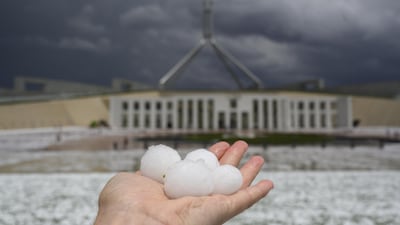 Golf ball-sized hail is shown at Parliament House in Canberra, Australia. Getty Images