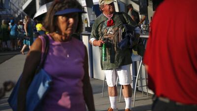 A man waits to enter a match at the 2014 US Open tennis tournament in New York City. Shannon Stapleton / Reuters / August 27, 2014