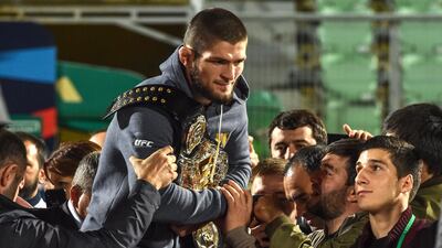 Khabib Nurmagomedov meets fans in Makhachkala/ AFP