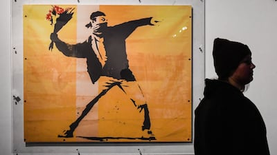 There have been several attempts to unmask the artist behind the pseudonym Banksy ever since his work first started appearing in the UK in the 1990s. AFP