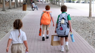Second-hand uniforms are a fantastic way to save money, particularly because children can grow out of clothes so quickly. Chris Whiteoak / The National