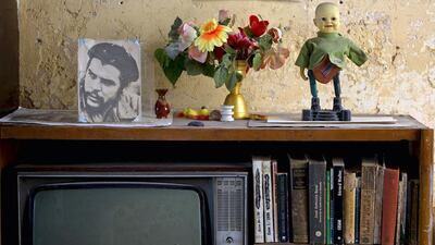 A photo of revolutionary icon Che Guevara is displayed on top of a TV in Havana. The restoration of diplomatic ties between Cuba and the United States has unleashed expectations of even more momentous changes in Cuba. Ramon Espinosa / AP Photo