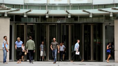 People arrive and depart from Broadcasting House, the headquarters of the BBC, in London. Reuters