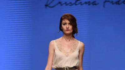 A model walks the runway at the Kristina Fidelskaya show during FFWD spring/summer 2017 at Dubai Design District. Courtesy of Fashion Forward / Getty Images