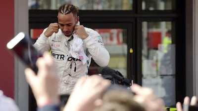 Mercedes-GP driver Lewis Hamilton makes his way to the podium after winning the Spanish Formula One Grand Prix at the Circuit de Catalunya. Pierre-Philippe M\rcou / AFP
