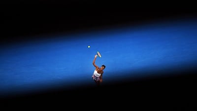 Venus Williams serves during the Australian Open final. Dean Lewins / EPA