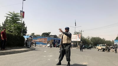 An Afghan policeman keeps watch near the site of a blast in Kabul, Afghanistan August 7, 2019. Reuters