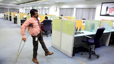 Rajeev Mehta is one of about 90 physically challenged Indians who work at the EuroAble call centre in Chembur, Mumbai. Subhash Sharma for The National