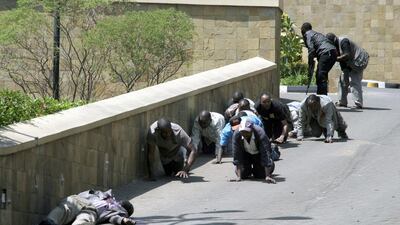 At least 30 people were killed and dozens more wounded during the brazen attack that began just after noon. Sayyid Azim / AP Photo