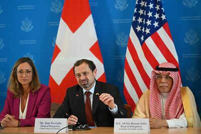 Sibylle Obrist, the head of the Swiss delegation, US special envoy for Sudan Tom Perriello, and head of the Saudi delegation Ali bin Hassan Jafar, in Geneva on Friday. AFP