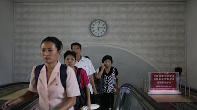 This clock on the wall of an underground train station in Pyongyang will be running 30 minutes behind from next week, when North Korea pulls back its current standard time. Wong Maye-E, File/AP Photo