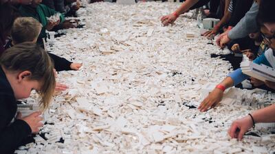 Visitors were able to build a small part of a new Lego city during the day. AFP