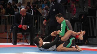 Faisal Al Ketbi, right, in action during his gold medal match. Amith Passela / The National