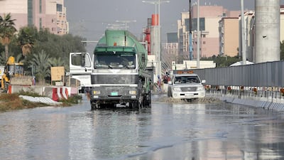 Waterlogging near the under construction Dubai Metro site by Discovery Gardens. Pawan Singh / The National