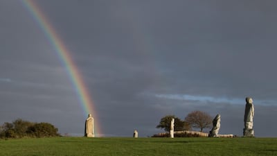 A picture shows monumental statues of the valley of the Saints in Carnoet, western France. In the village sculptors have created giant four-metre high granite statues of saints and placed them on a feudal mound. AFP