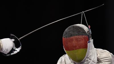 Maurice Schmidt of Team Germany, right, competes against Piers Gilliver of Team Great Britain in the men's sabre category at the Paralympic Games. Getty Images