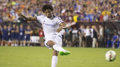 Chelsea forward Loic Remy fires in the winning shot in a penalty shootout to conclude Tuesday's pre-season friendly against Barcelona. Michael Reynolds / EPA