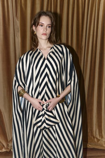 AKS The Label reimagines traditional abayas and kaftans with a modern sensibility, from bias-cut stripes to delicately textured chiffon. Photo: AKS The Label