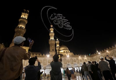 Drones spell out Ramadan wishes in a light show above Al Azhar mosque in the old Islamic area of Cairo, Egypt. Reuters