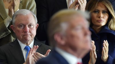 US Attorney General Jeff Sessions and First Lady Melania Trump applaud as US President Donald Trump speaks. AFP
