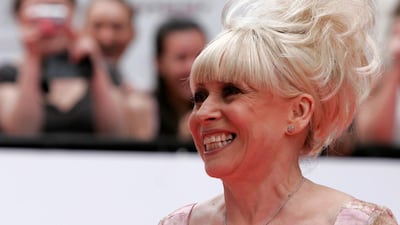 Fans photograph actress Barbara Windsor as she arrives for the British Academy Television Awards at the Palladium Theatre in London May 20, 2007. REUTERS