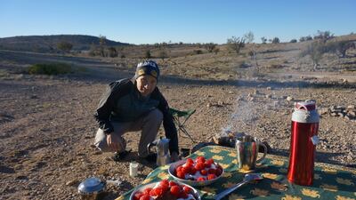 Darryl Chiles preparing breakfast in Musandam. Courtesy of Ivana and Darryl Chiles