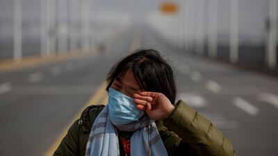 China returns after the Lunar New Year holiday was extended to curb the spread of a deadly new Sars-like virus. Reuters