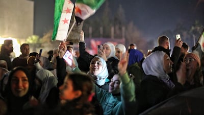 Syrians celebrating in the streets of Damascus after Ahmad Al Shara was declared 'interim' president. EPA