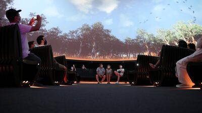 Visitors to the Australia Pavilion enjoy the audio-visual show