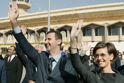 Bashar Al Assad and his wife Asma in Aleppo in 2003. AFP