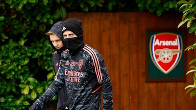 Arsenal's Jorginho and Martin Odegaard attend the team's training session in London. Reuters