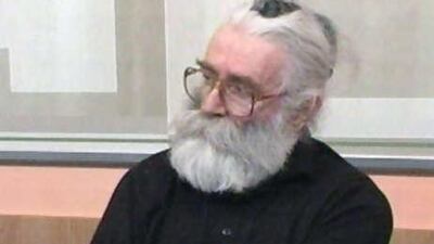 This image, taken from Kikinda Television, shows the former Bosnian Serb wartime leader Radovan Karadzic attending a conference sponsored by "Healthy Life" magazine under the false identity of Dragan Dabic on January 28, 2008 in Kikinda, Serbia.