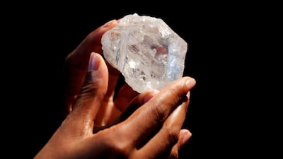 FILE PHOTO: A model displays the 1109 carat "Lesedi La Rona" diamond at Sotheby's in the Manhattan borough of New York, U.S. on May 4, 2016. REUTERS/Lucas Jackson/File Photo