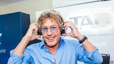 The Who’s Roger Daltry tries on headphones. Courtesy Lumin