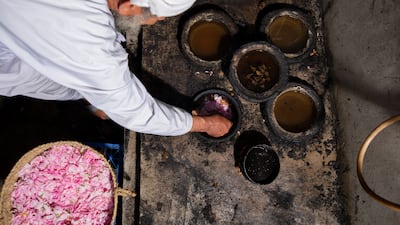 Al-Thani's system uses a bowl heated by a central gas fire. The condensation produces smoky rosewater.