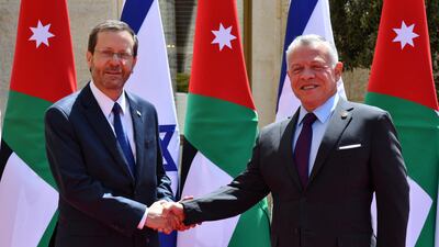 Israeli President Isaac Herzog with Jordan's King Abdullah II in Amman, March 30, 2022. Reuters